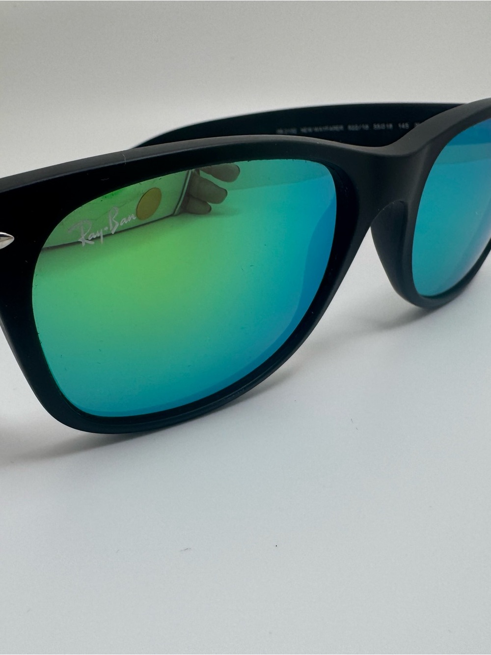 Ray-Ban Matte Black Frame Sunglasses with Blue-Green Mirrored Lenses
